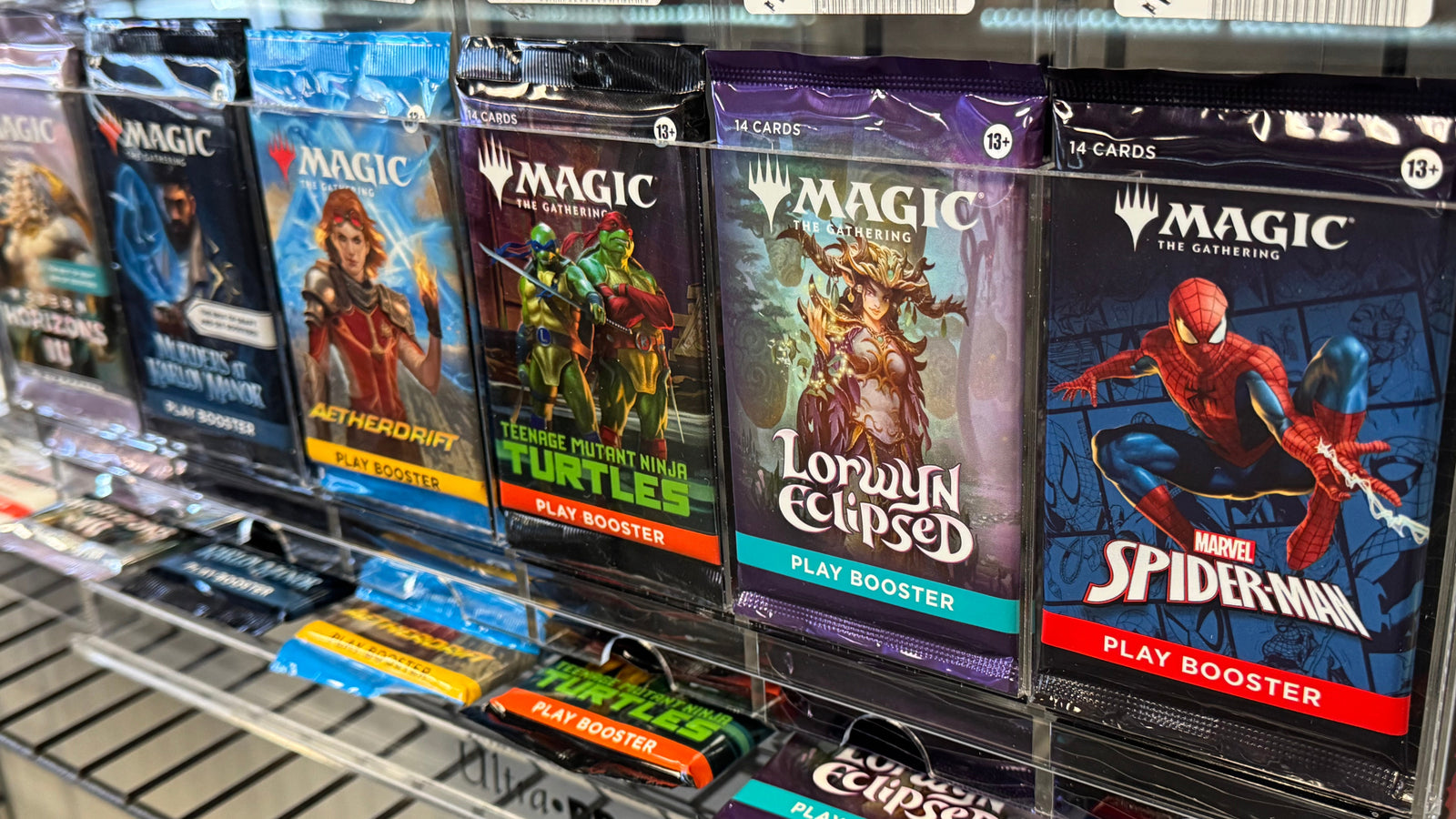 Magic: The Gathering trading card game booster packs displayed at 8-Bit Legends Video Games store in Jonesboro Arkansas