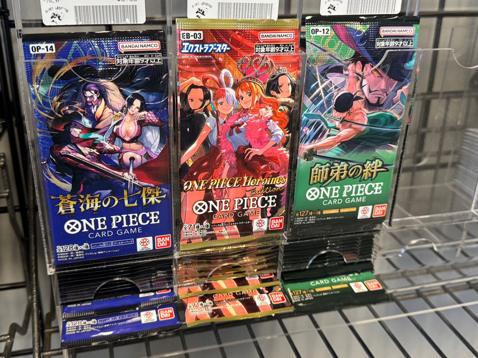 One Piece trading card game booster packs on display at 8-Bit Legends Video Games in Jonesboro Arkansas