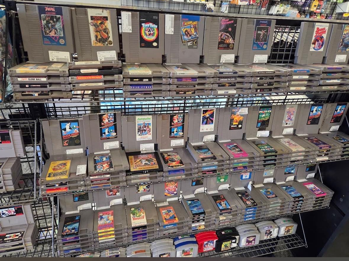 rack of retro nes video games at 8-Bit Legends retro video game store in Jonesboro Arkansas