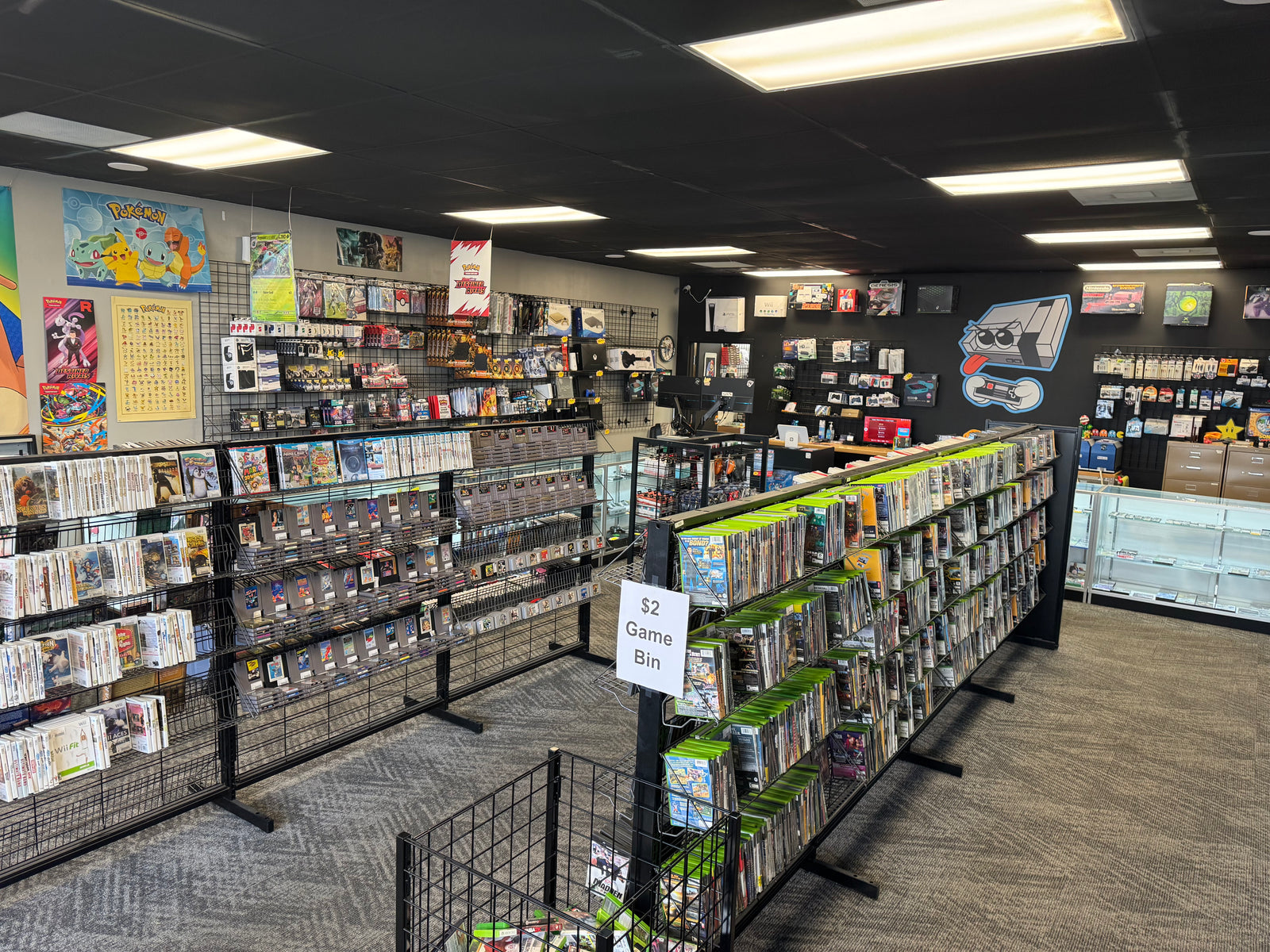 inside 8-Bit Legends retro video game store in Jonesboro Arkansas showing retro games and gaming merchandise
