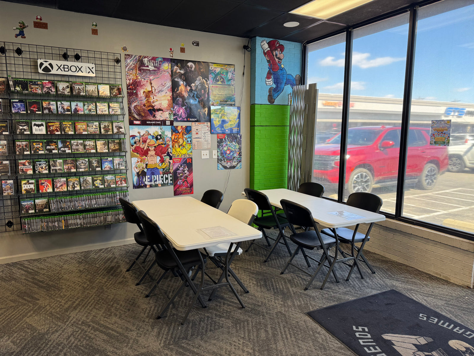 Trading card game play area with tables for card nights and TCG events at 8-Bit Legends Video Games in Jonesboro Arkansas